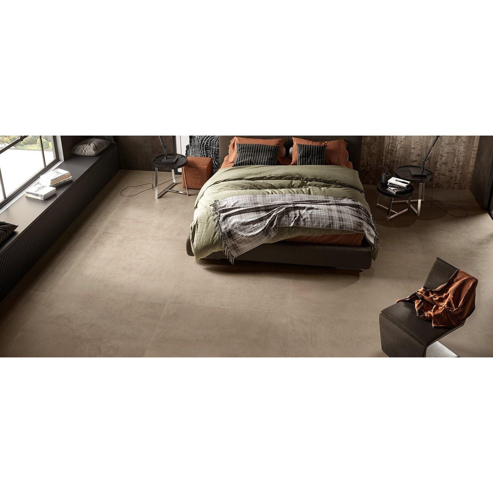 Modern minimalist bedroom featuring boost clay matt 60 x 60cm earth-toned ceramic tiles with olive green bedding