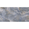 Blue-gray marble porcelain tile with swirling white and beige veining california porcelain ocean design