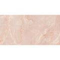 A rectangular pink marble porcelain tile with subtle veining and a smooth polished surface california porcelain rose