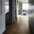 Canaiolo castagno warm-toned hardwood floor with visible wood grain and natural knots