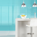 Colorado Clear Glass 600 x 300mm teal glass countertop with a white ceramic bowl of lemons