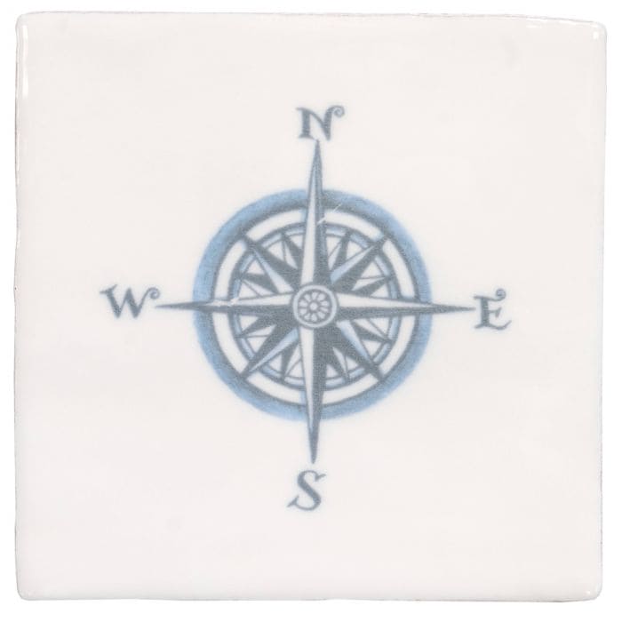 White ceramic coaster with detailed blue compass rose design and cardinal directions in compass blue on cotton style