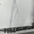 Cosmopolitan statuario extra matt 80 x 80cm white marble backsplash with elegant gray veining