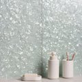 Crushed Pearl Decorative Glass frosted white crushed-glass tiles with a white soap dispenser