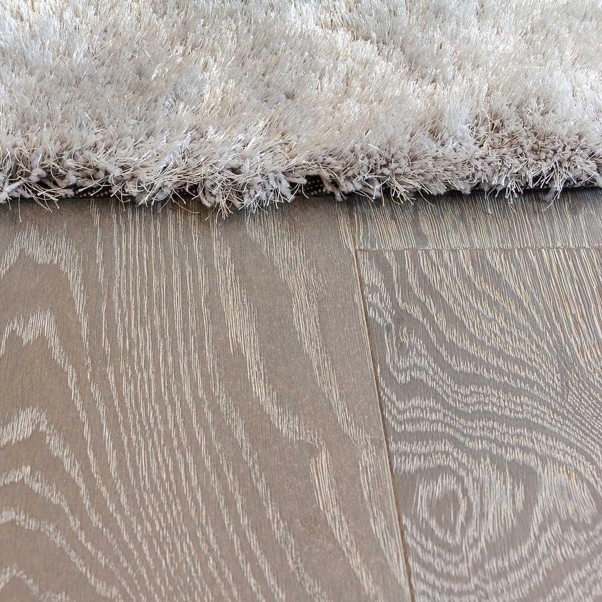 DC105 Deco Silver Haze grey oak engineered wood flooring with a shaggy grey rug