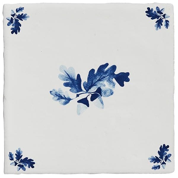 White ceramic tile with delicate blue oak leaf and acorn delftware motif from dyrham dairy ceramic decors