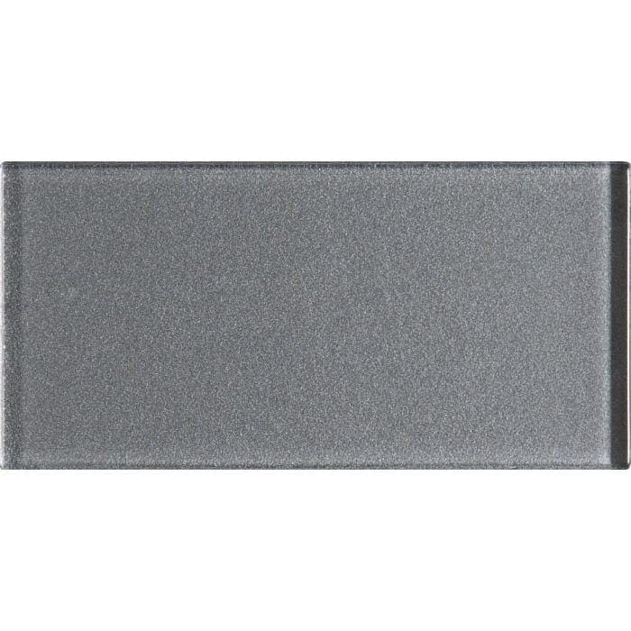 A sleek rectangular gray metallic tile with a subtle textured surface called erebos metallica brick