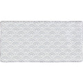 White rectangular bath mat from fabrique rosaline french blue with subtle raised gray scalloped wave pattern