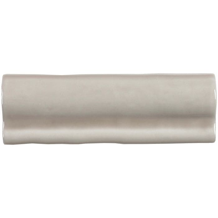 Beige ceramic flint torus moulding tile with smooth glossy finish and subtle wavy edges for decorative edging