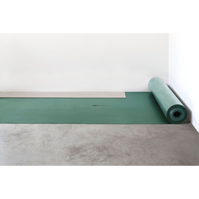 A rolled-up green waterproof floorify performance underlay mat partially unrolled showing its smooth surface and branding
