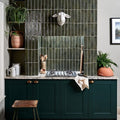 Dark green glossy vertical porcelain subway tiles with a slightly textured finish for backsplash foundry porcelain smeraldo