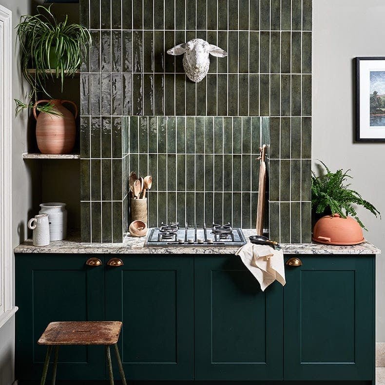 Dark green glossy vertical porcelain subway tiles with a slightly textured finish for backsplash foundry porcelain smeraldo