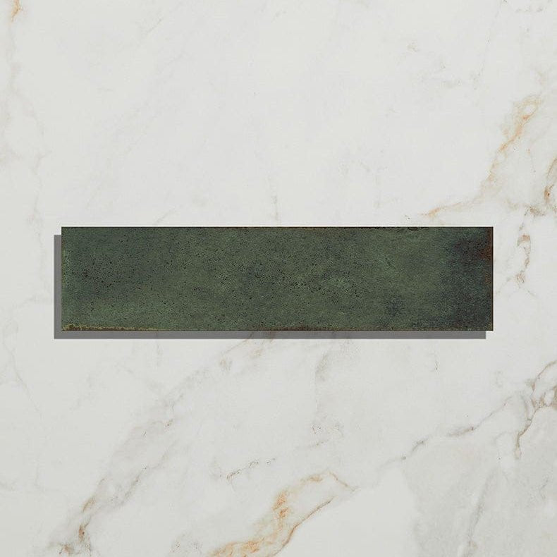 Dark green rectangular ceramic tile with matte slightly textured surface from foundry porcelain smeraldo collection