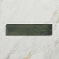 Dark green rectangular ceramic tile with matte slightly textured surface from foundry porcelain smeraldo collection