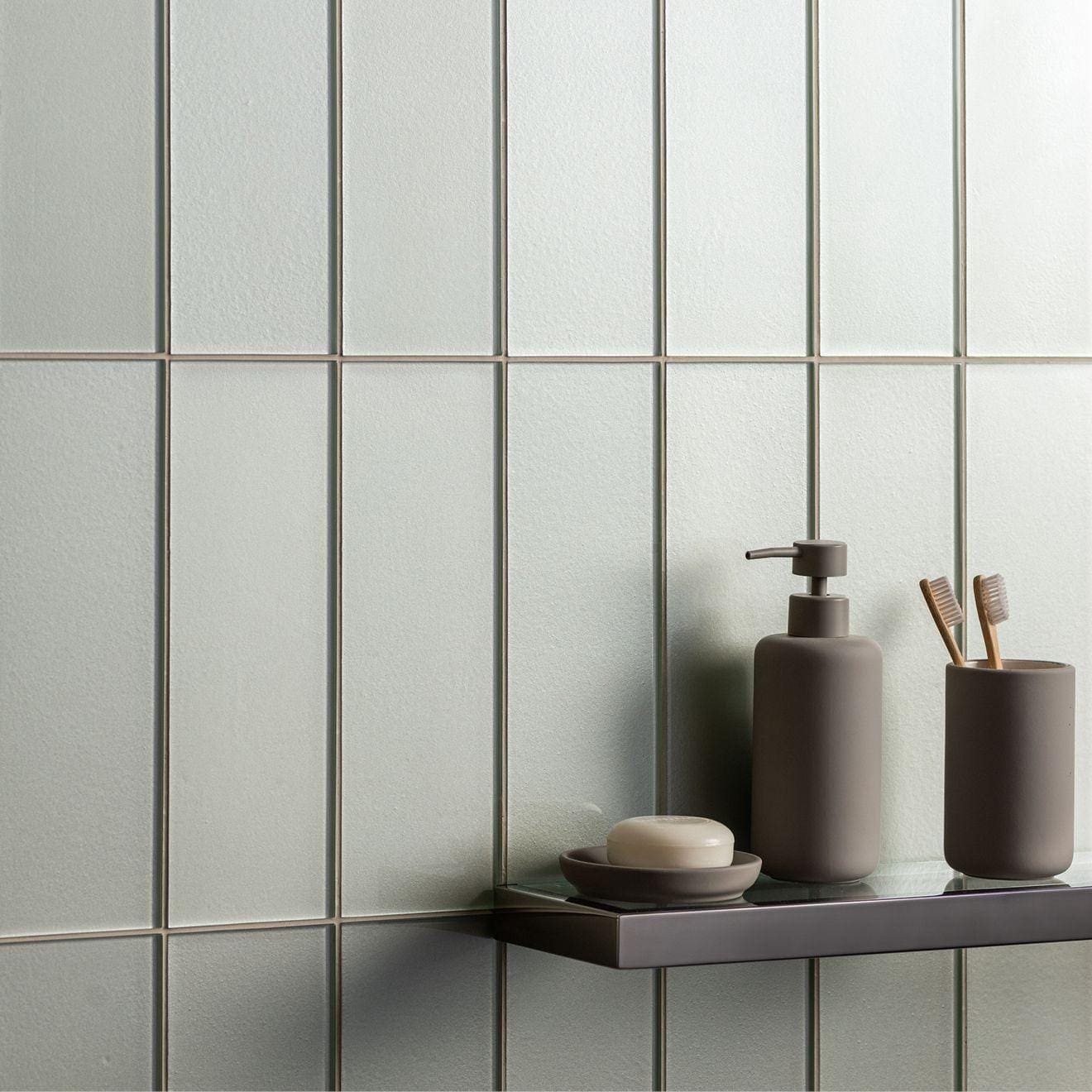 Gray ceramic soap dispenser galatea metallica with matte finish and minimalist design for bathroom use