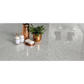 Gemstones Terrazzo White Matt 60 x 60cm white terrazzo tiles with a rose gold soap dispenser