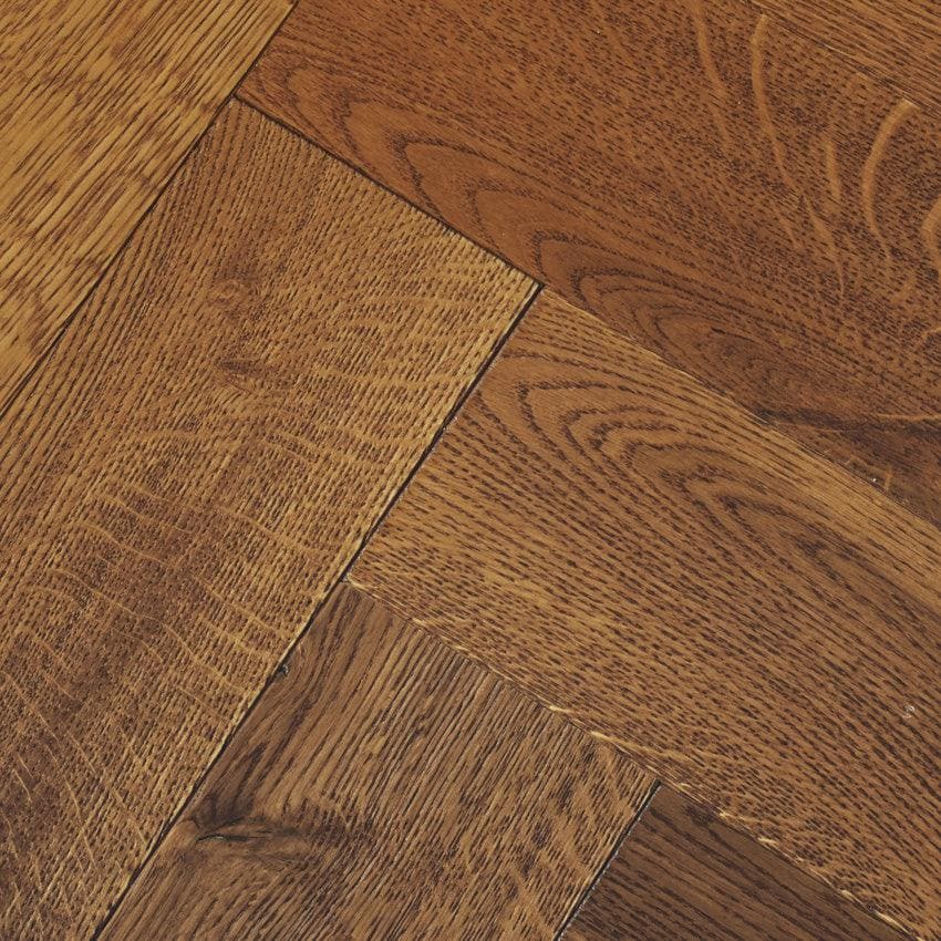 Goodrich coffee oak rich brown hardwood flooring with herringbone pattern and natural wood grain texture
