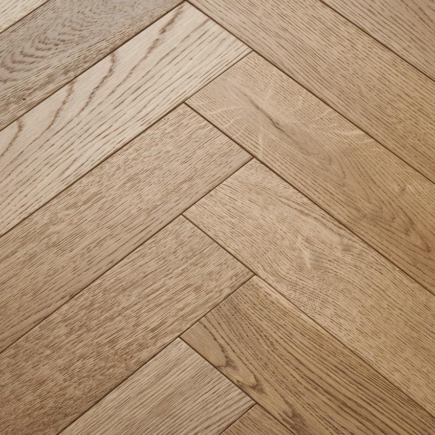 Light oak hardwood flooring in a herringbone pattern from goodrich natural oak collection
