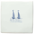 White ceramic coaster with delicate blue hand-painted sailboats from Grace & Ann of Liverpool Delft Boats collection