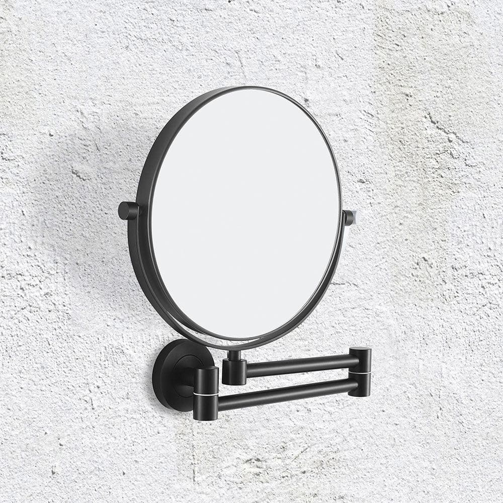 Black matte finished hutton reversible 5x magnifying wall mirror with sleek articulated arm mounted on wall