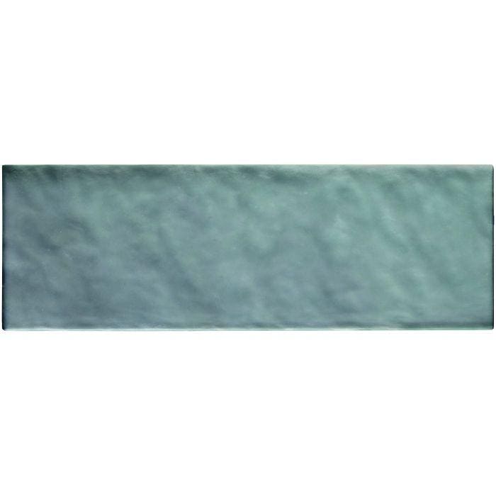 A rectangular ceramic tile with textured mottled teal glaze from janus eclipse collection for interior use