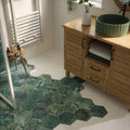 Hexagonal green tropical leaf patterned porcelain bathroom floor tiles from jungle hexagon by clarissa hulse