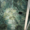 Hexagonal green and teal tropical leaf patterned porcelain bathroom floor tiles jungle hexagon by clarissa hulse