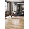 Kingfisher Chestnut golden brown wood-effect floor tiles with a black leather sofa