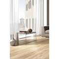 Kingfisher Oak light oak wood-effect floor tiles with a black metal coffee table