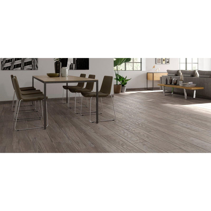 Gray wood-look laminate flooring landes gris with realistic grain pattern and durable surface for home use
