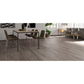 Gray wood-look laminate flooring landes gris with realistic grain pattern and durable surface for home use