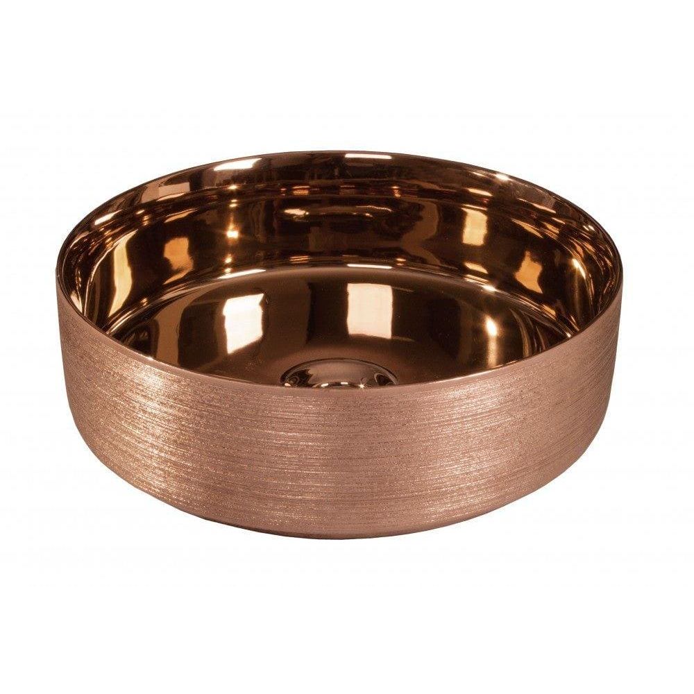 A sleek rose gold Lavabo Heller bathroom sink with brushed metallic finish and glossy interior