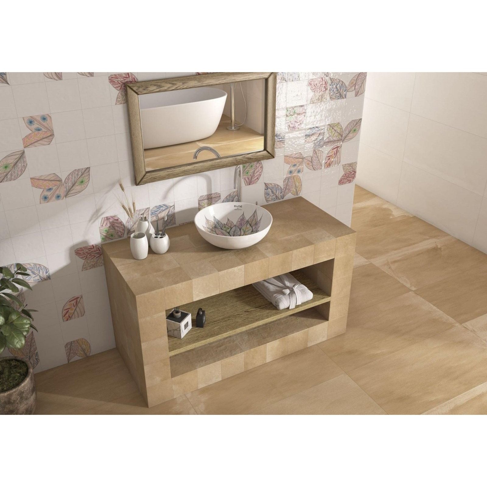 Lavabo Rafaela white leaf-patterned vessel sink on a light wood vanity