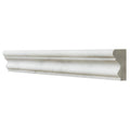 White marble-style crown molding with ornate classic profile in long island marble dado honed finish