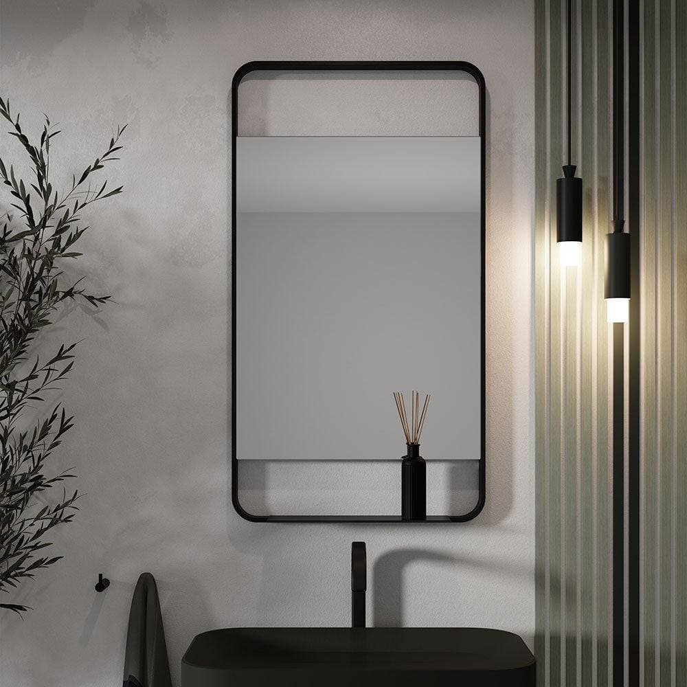 Black rectangular ludgate mirror with sleek frame and integrated shelf below measuring 55x100cm