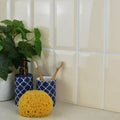 Yellow porous sponge for metro cream gloss designed for smooth and even application of cream products