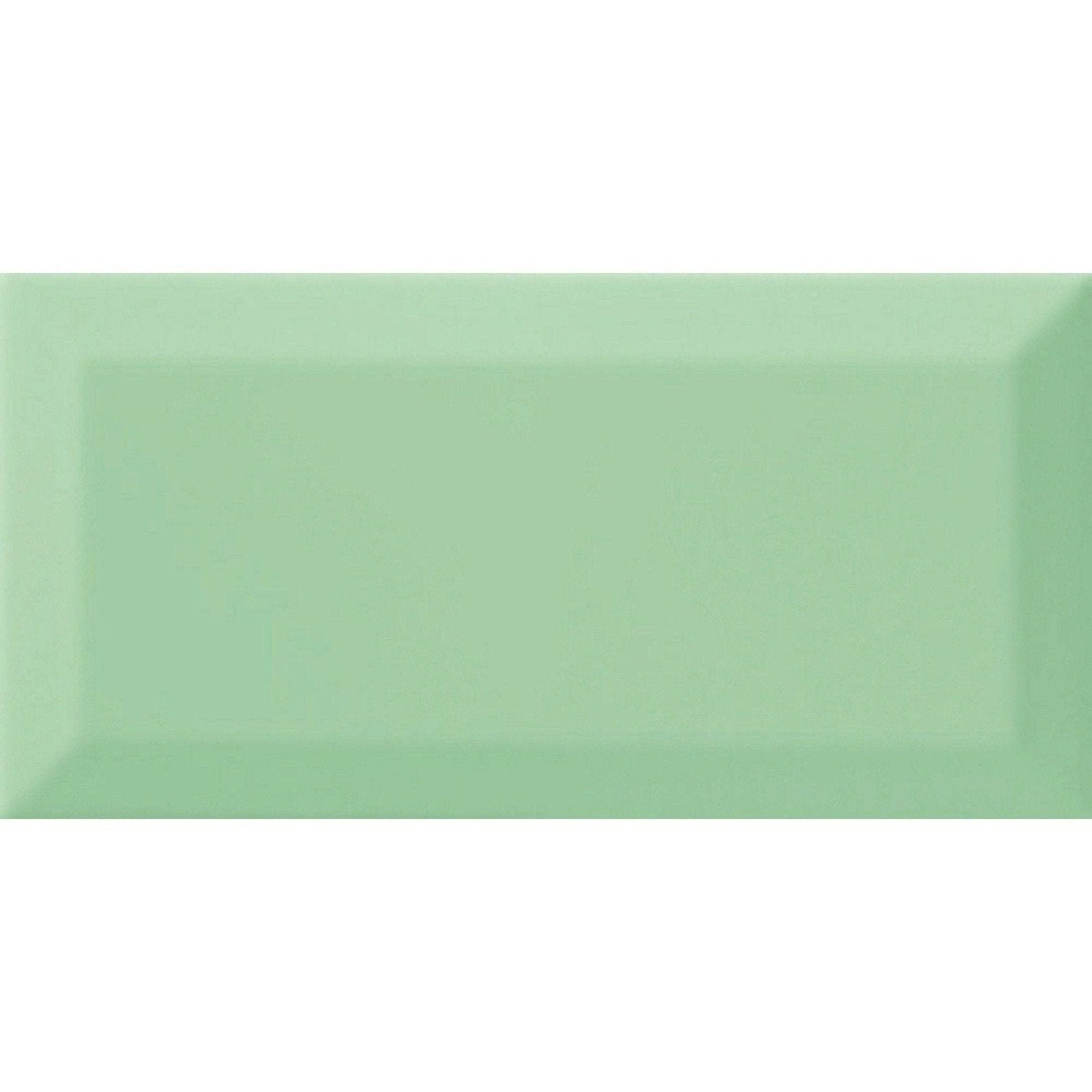 A rectangular matte-finished mint green ceramic tile with a subtle raised border from metro mint green gloss collection