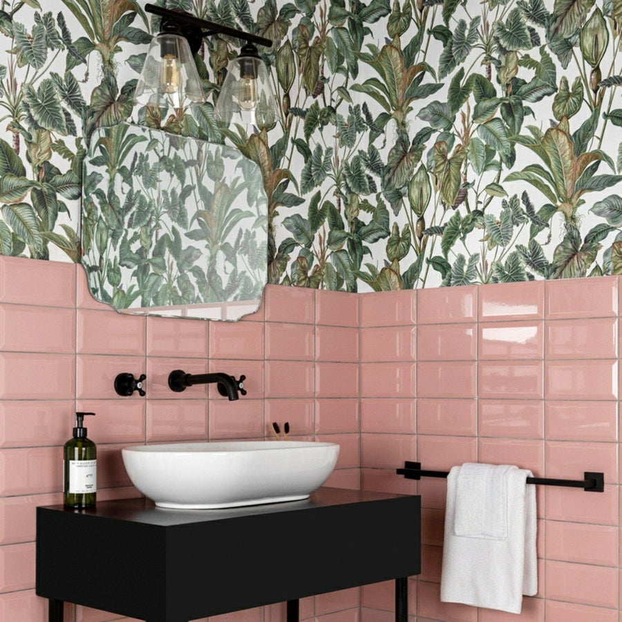 White ceramic vessel sink with sleek modern design on black countertop in metro pink gloss collection