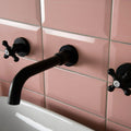 Black matte-finish wall-mounted faucet with cross-shaped handles marked h and c in metro pink gloss design