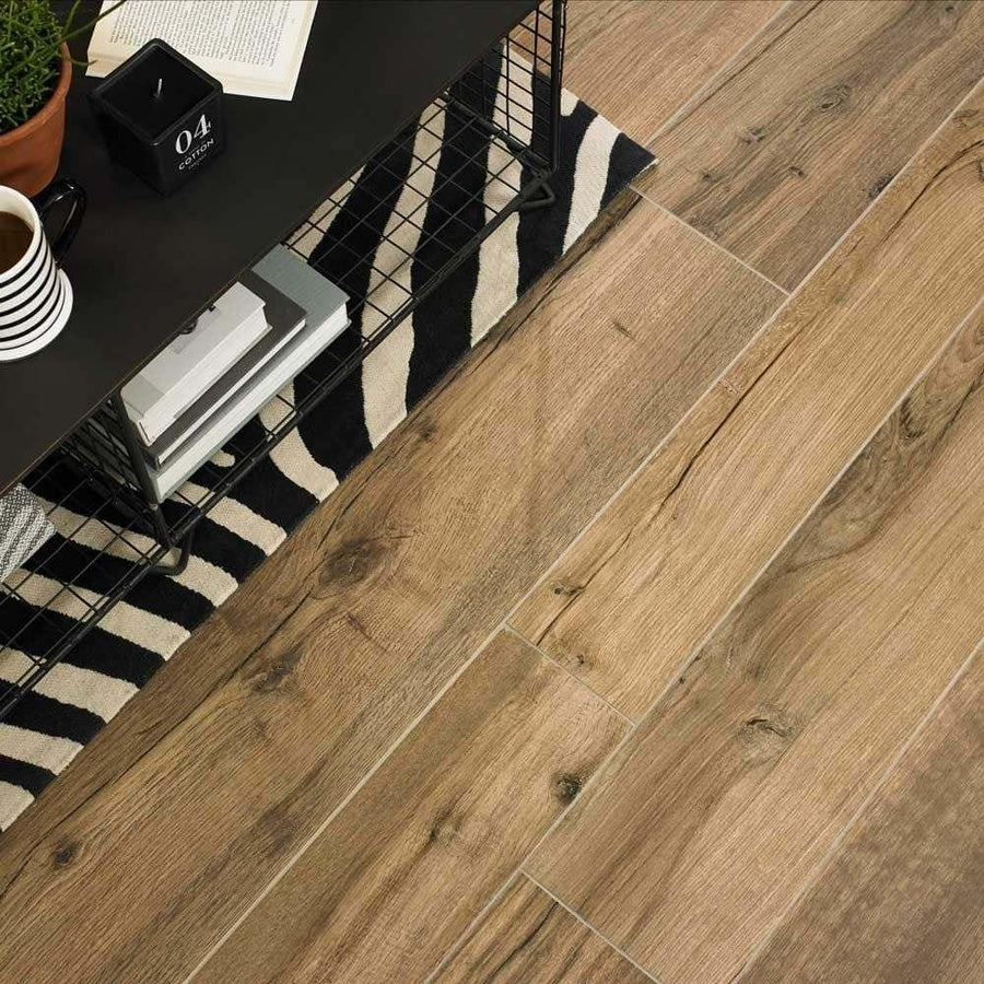 Light brown mumble c honey oak tiles with wood-look finish natural grain and subtle knots for flooring