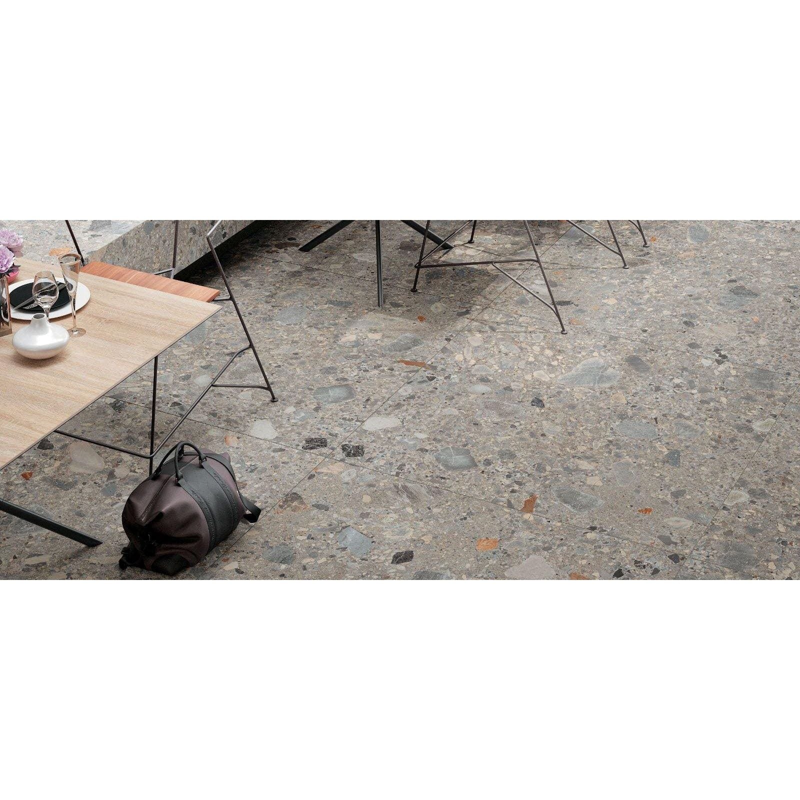 Gray terrazzo floor norway farge matt with speckled aggregate and subtle stone inlays for interior flooring