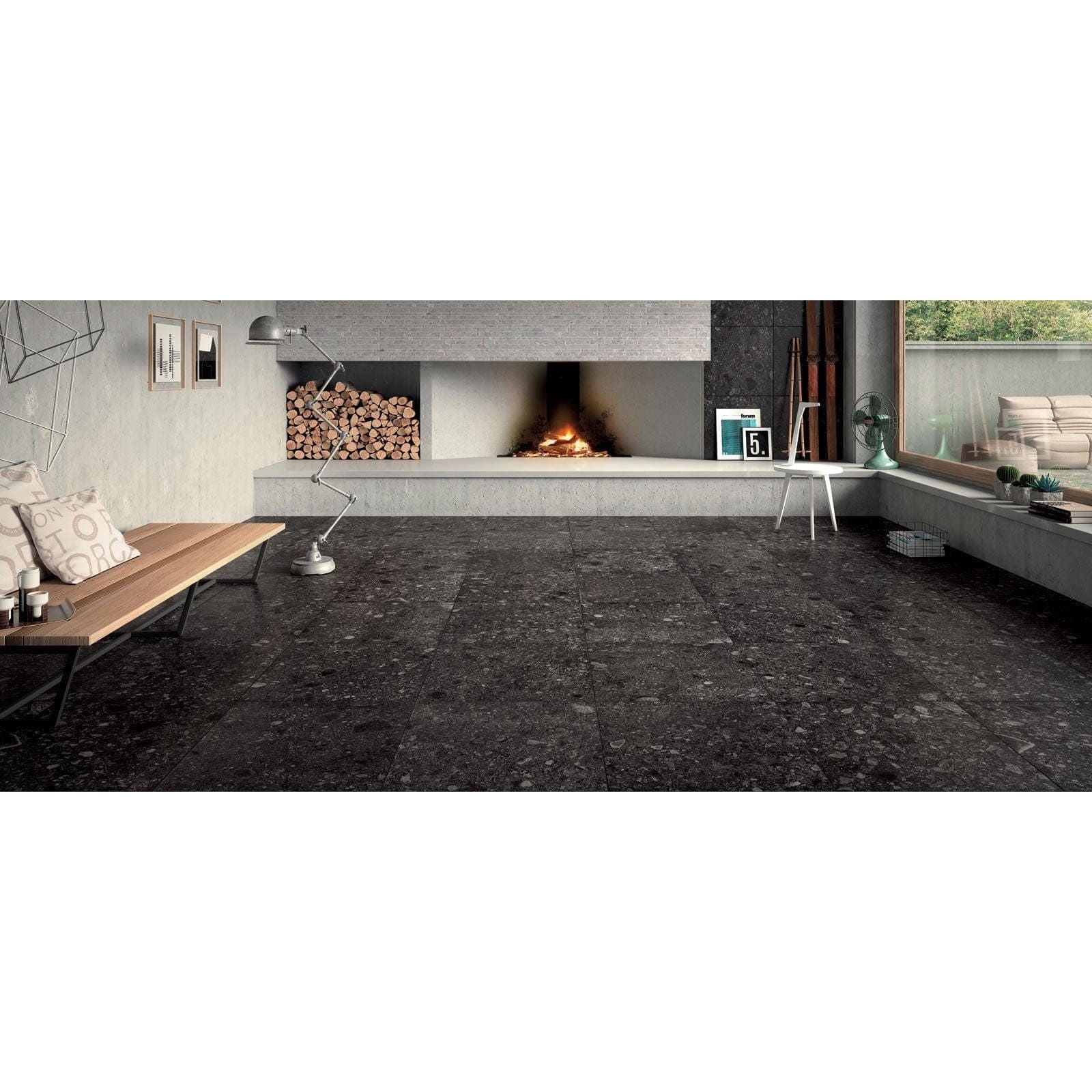 Norway svart matt dark gray stone-effect floor tiles with a speckled textured surface for indoor flooring