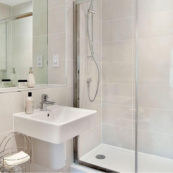 White ceramic wall-mounted sink with chrome faucet in olimpo bone matt 30 x 60cm for bathroom use