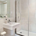 White ceramic wall-mounted sink with chrome faucet in olimpo bone matt 30 x 60cm for bathroom use