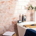 Pink marble-effect subway tiles onix rosa with subtle orange veining ideal for stylish wall coverings