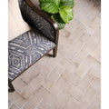Gray herringbone patterned floor tiles in osterley porcelain white brick for durable and stylish interior flooring