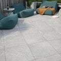 Pulse grey stone-effect patio tiles with subtle veining and a matte finish ideal for outdoor flooring
