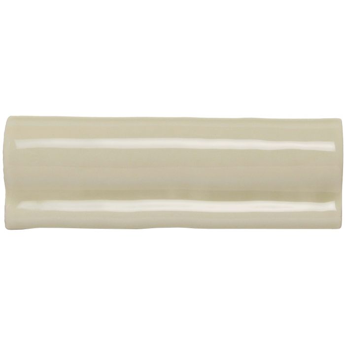 Cream-colored glossy ceramic pumice torus moulding tile with subtle curved edge and smooth surface for decorative trim