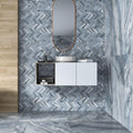 Rodas Smerato 60 x 60cm grey marble-effect tiles with a floating vanity and sink