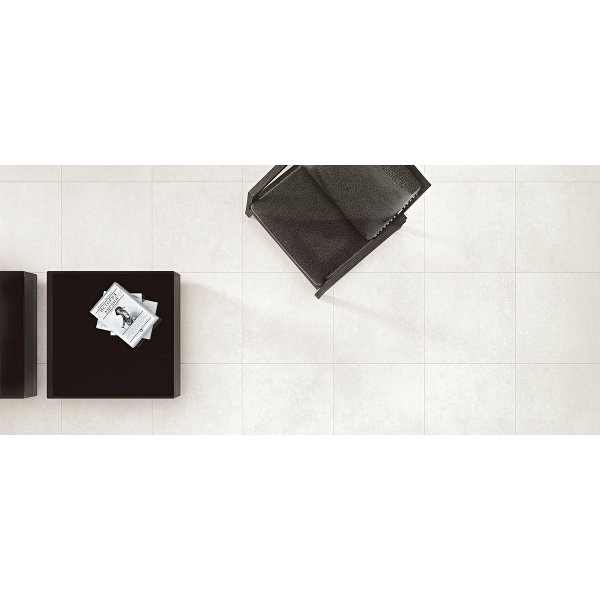 Select Bianco Matt 60 x 60cm cream ceramic tiles with a black leather chair